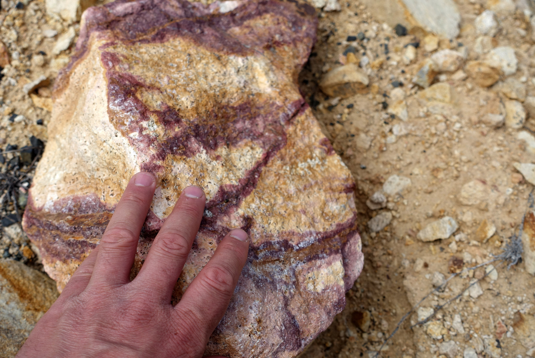 A contractor checking the types of rock on the site.